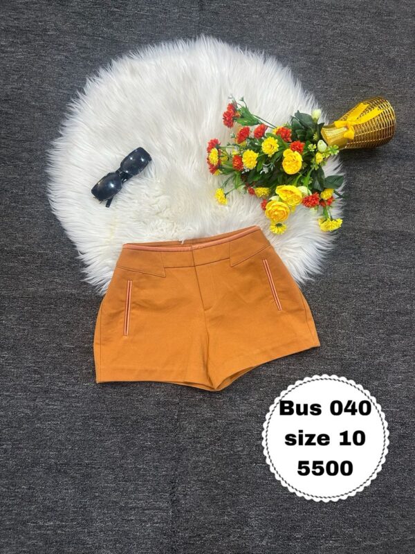 Stylish orange bum short Size 10