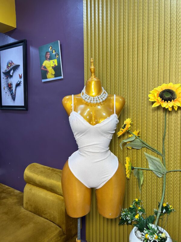 Nude pink sleeveless bodysuit Size 8