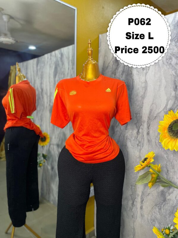 P062- Orange Adidas polo (L)